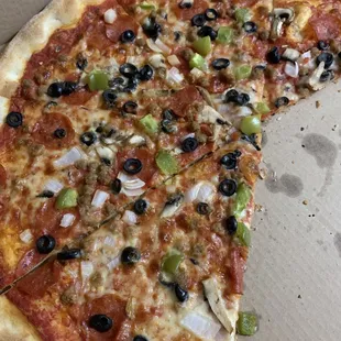 a whole pizza in a box