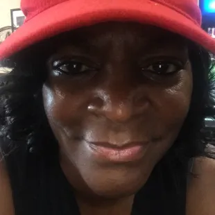 a woman wearing a red hat