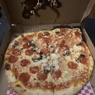 a pepperoni pizza in a box