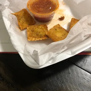 Fried Cheese Ravioli with House marinara. 5*