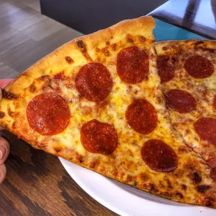 Super sized pepperoni lunch slices.