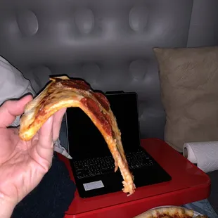 Droopy room temperature pizza.