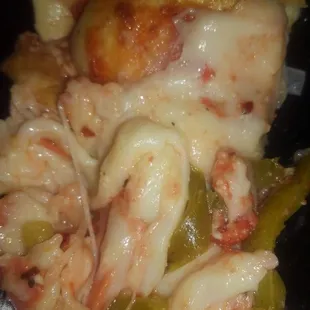 The pizza is stuffed and all you can taste is the cheese and green bell pepper. Minimal sauce, sauage and pepperoni.