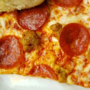 The sausage and pepperoni pizza.