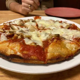 10&quot; cheese Chicago with mushrooms pizza