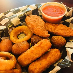 This is the appetizer sampler. switched out the jalapeño poppers with fried mushrooms. Marinara is perfect!