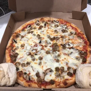 Medium sausage and mushroom pizza
