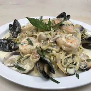 a plate of seafood pasta