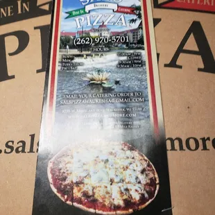 a pizza in a pizza box