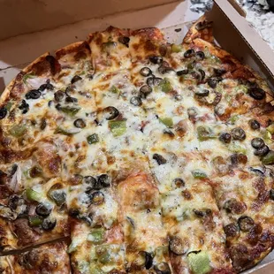 Sausage Combo Pizza (the thin crust is more on the thicker side).