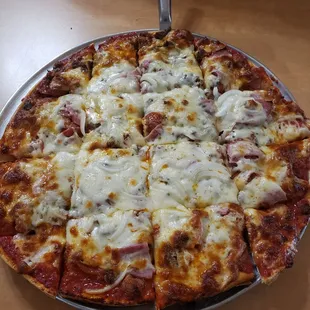 Sals meat lovers pizza added onion