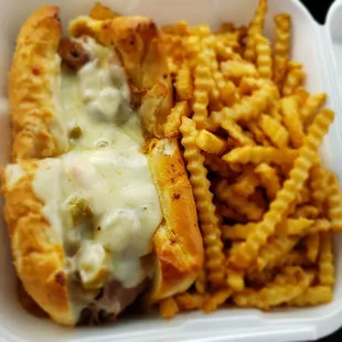 The house beef on garlic bread with frys.