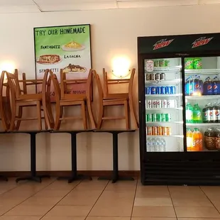 a dining room with chairs and tables