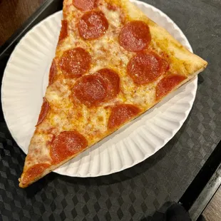 a slice of pepperoni pizza