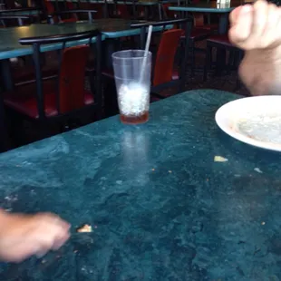 My husband waiting for a refill. It came after he finished his meal along with the check we didn't ask for. We did want dessert!