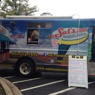 a food truck parked in a parking lot
