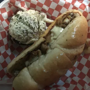 a sandwich with a side of coleslaw