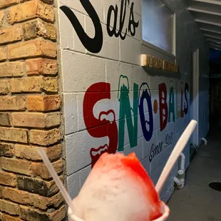 Stuffed snoball with coconut and strawberry side by side