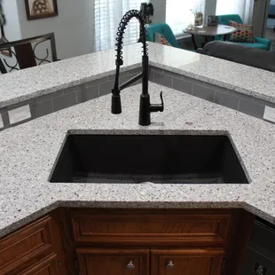 Pearl Gray Quartz with 3x6 Desert Gray subway tile.