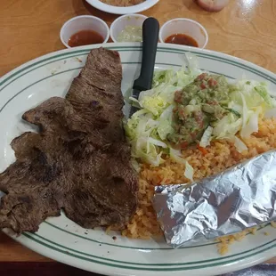 Carne asada with sauces from salsa bar