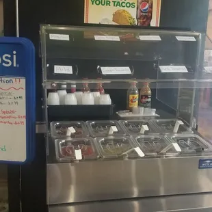 a display of a variety of condiments