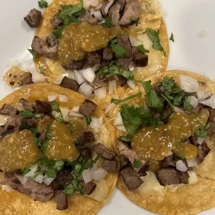 three tacos on a plate