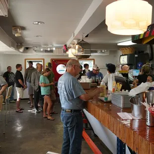 a crowd of people at a restaurant