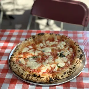 I travel a lot, especially through Italy. No other pizza tastes more like Italian pizza  than this place