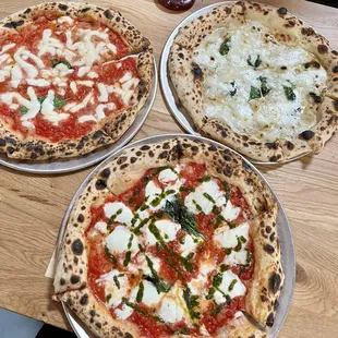Top left: Margherita, Top right: 4 formaggi, Bottom: Salsa pizza. All delicious.