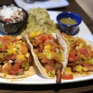 Three taco diner: all al pastor with rice, beans and salsa