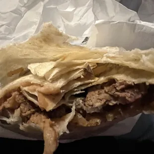 The sharp piece on the tortilla is a hard shard of plastic