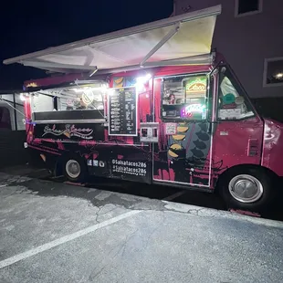 a food truck parked in a parking lot