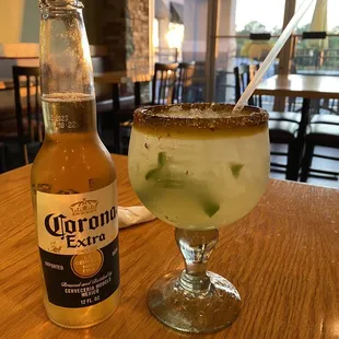 a margarita and a bottle of corona extra