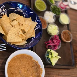 Been and tortilla chips sith all the delicious sauces