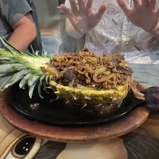 Warming his hands on the Pina Loca