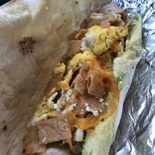 Inside view of the Migas Taco w/ cheese and avocado