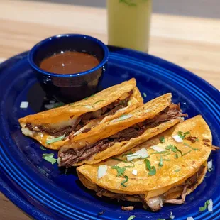 Quesabirria tacos and consomme