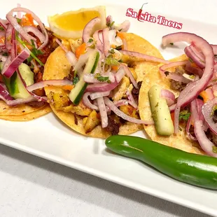 Pickled cucumber, onions, and carrots