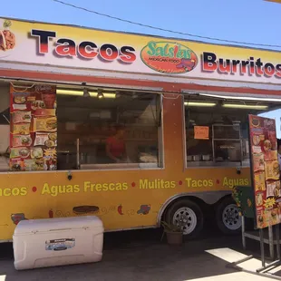 a taco truck parked in a parking lot