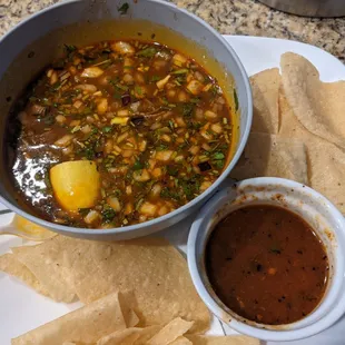 Birria soup to-go. If you go with corn tortillas on side, recommend a side of refried beans, place in tortilla, roll up, and dip in soup.