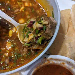 Birria soup to-go, so good. Recommend chips and salsa on side.