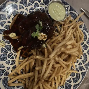 Filet mignon with shoestring fries and cabernet demi-glace.