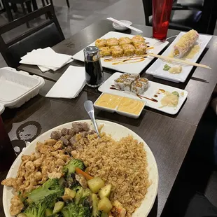 Chicken/Steak Hibachi dinner, LSU/Sweet Potato/Crunchy Crab rolls.
