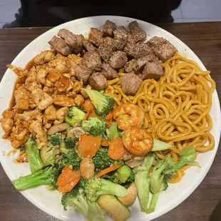 Chicken and steak habachi plate with noodles