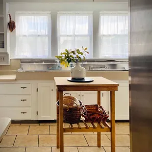 Our beautiful farmhouse kitchen (with industrial fridge/freezer) is ready to serve!