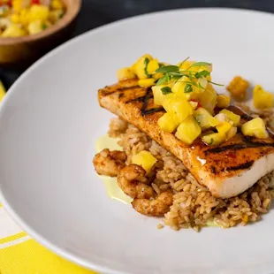 Key lime mahi mahi with sautéed shrimp, key lime coconut rice, lime cream sauce and Caribbean salsa.