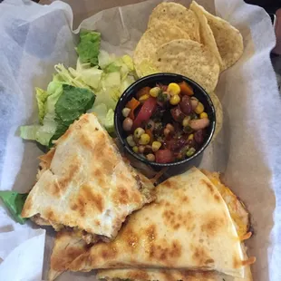 Chicken Quesadilla, comes with cowboy caviar.