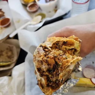 3 meat burrito with double pastor and carnitas.