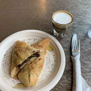 Spinach fatayer and a cortado. It will be hard NOT to order this again, but one must try the rest of the offerings!