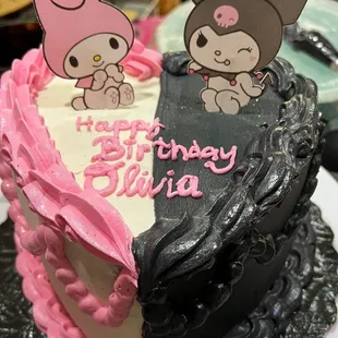 a chocolate cake with pink frosting